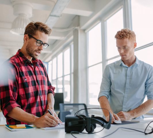 young-colleagues-working-on-a-project-P23BF8H