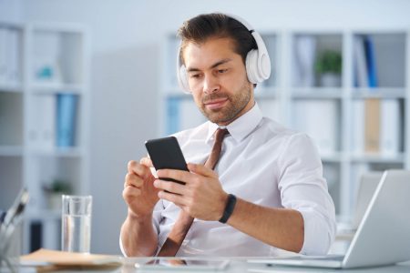 contemporary-restful-businessman-in-headphones-2021-09-24-02-43-08-utc