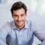 happy-businessman-smiling-2021-08-28-17-20-26-utc