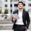 happy-businessman-with-tablet-walking-in-the-city-2021-08-26-18-20-01-utc
