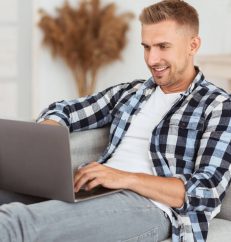 happy-freelancer-chatting-online-on-laptop-at-home-2021-08-29-09-39-30-utc