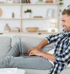 happy-man-chatting-online-on-laptop-with-friend-at-2021-08-28-21-58-32-utc