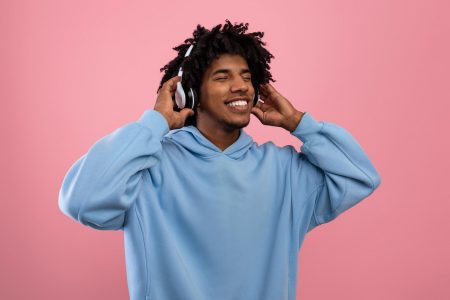 attractive-black-teen-guy-in-casual-wear-listening-2022-01-30-08-42-49-utc