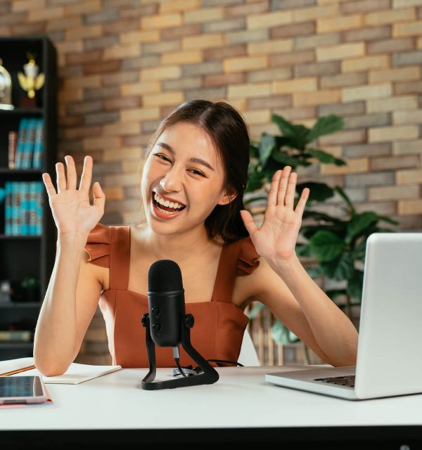 cheerful-blogger-using-mic-for-podcast-2021-09-04-03-50-50-utc