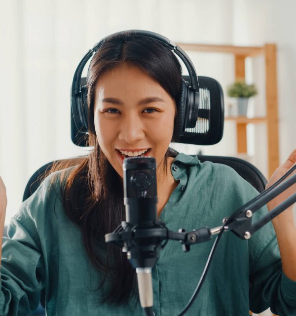 happy-asia-girl-record-a-podcast-with-headphones-a-2021-09-02-07-17-51-utc
