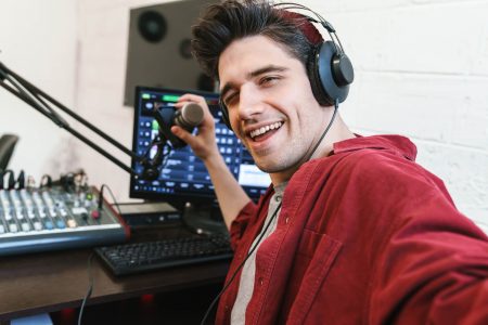 image-of-young-happy-dj-man-wearing-headphones-wor-2021-08-30-02-26-03-utc