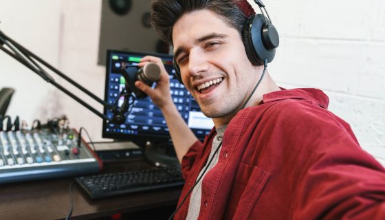 image-of-young-happy-dj-man-wearing-headphones-wor-2021-08-30-02-26-03-utc