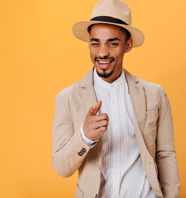 man-winks-and-points-his-finger-at-camera-on-orang-2022-02-07-10-20-25-utc