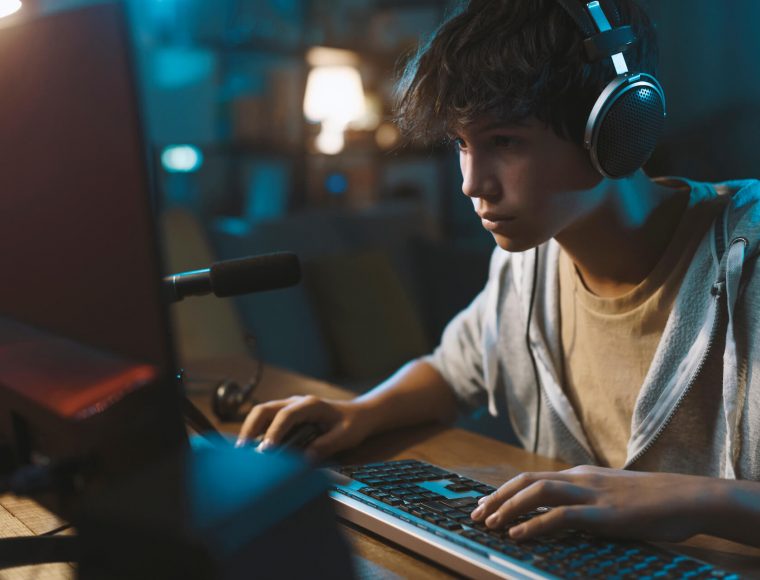 teenager-wearing-headphones-and-playing-online-vid-2022-01-19-00-21-34-utc