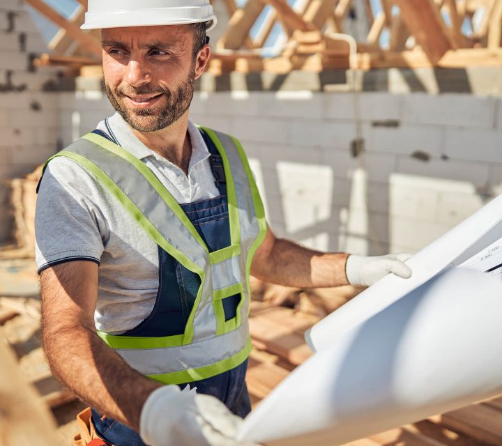 cheerful-young-architect-working-at-big-project-2021-09-03-21-02-38-utc