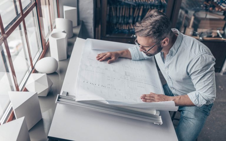 mature-architect-at-the-desk-2021-08-26-15-47-54-utc